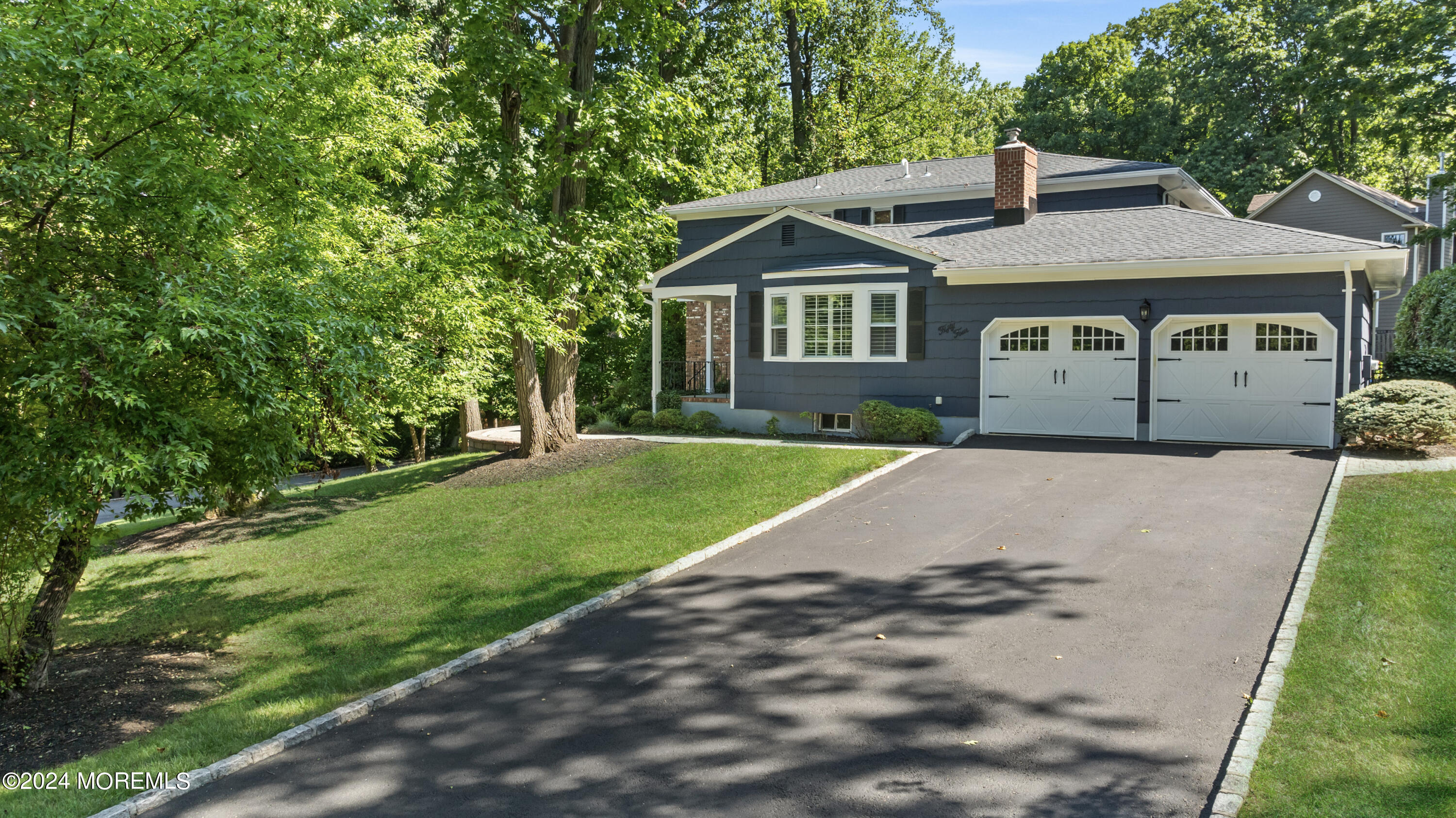54 Rutherford Road Berkeley Heights, NJ 07922 - Photo 3 of 43 a front view of a house with a yard