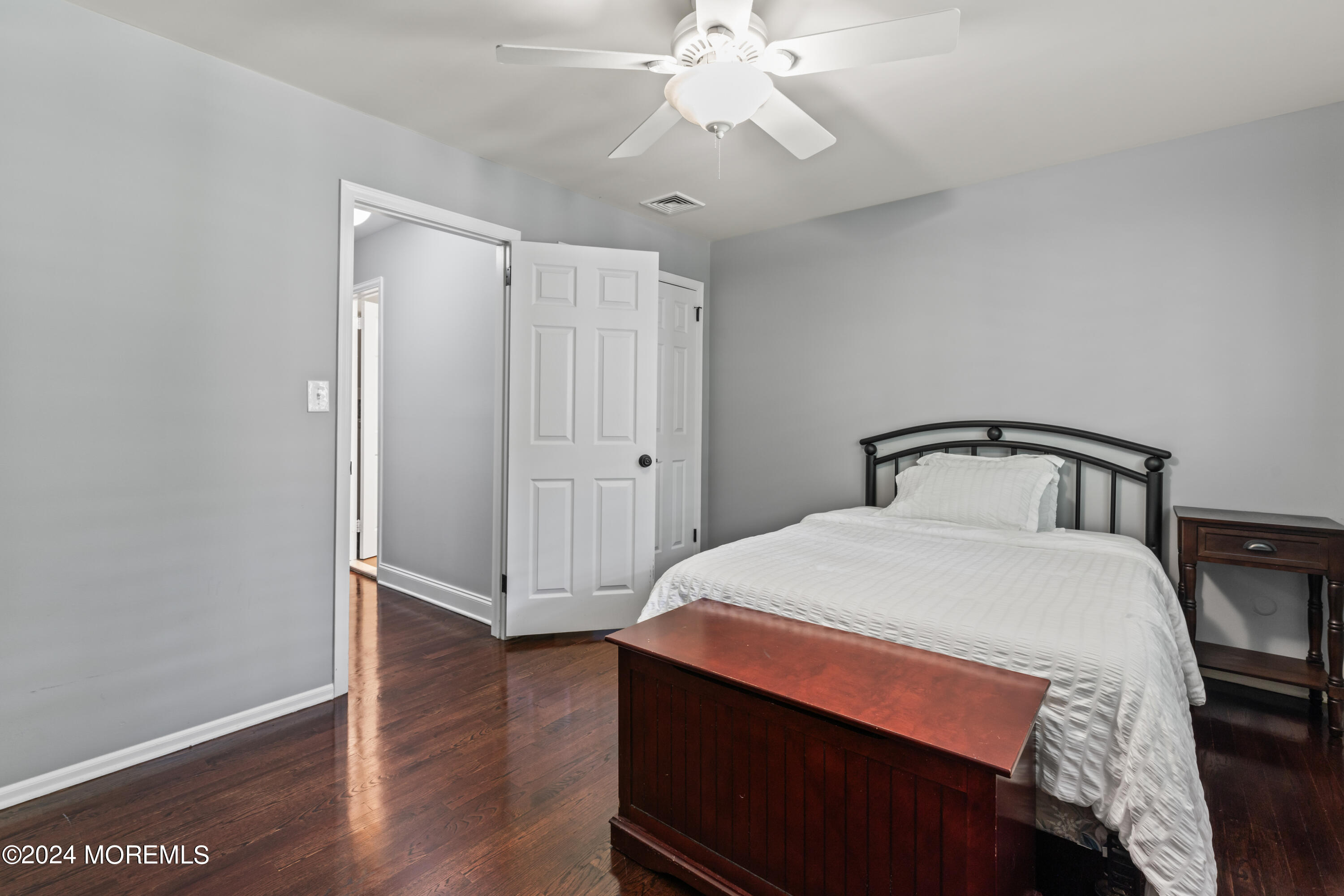 54 Rutherford Road Berkeley Heights, NJ 07922 - Photo 31 of 43 a bedroom with a bed and wooden floor