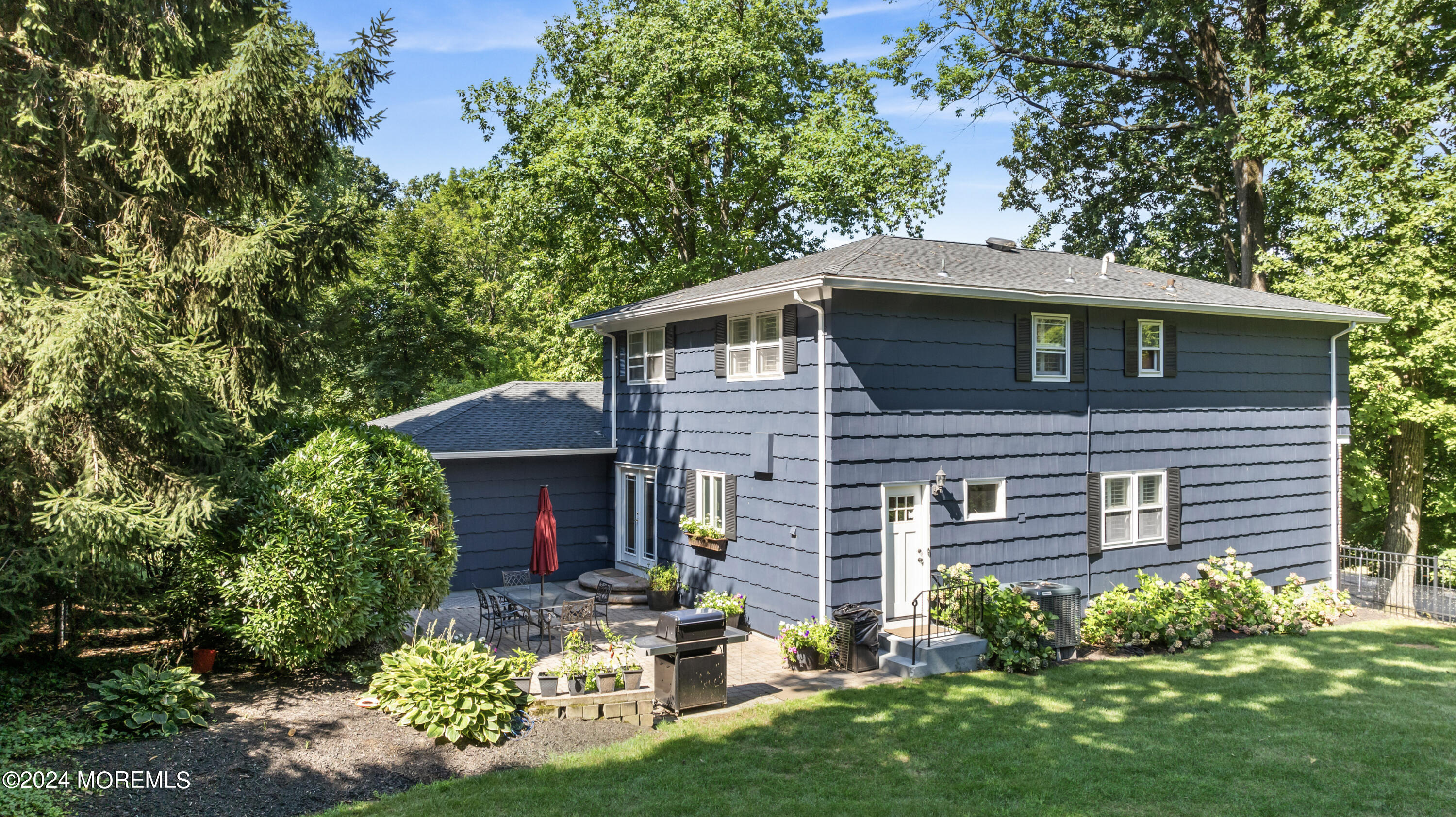 54 Rutherford Road Berkeley Heights, NJ 07922 - Photo 33 of 43 a front view of a house with a yard
