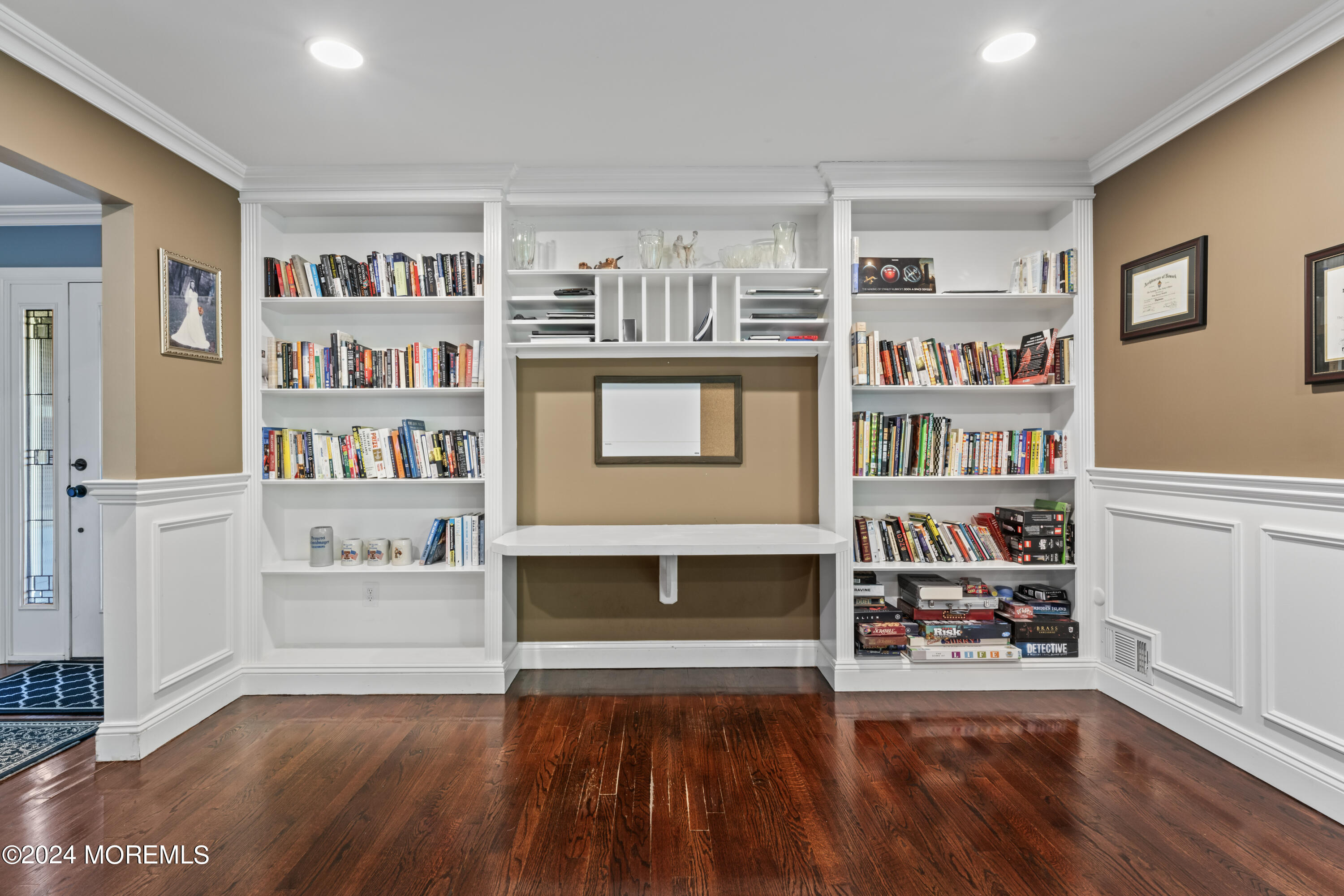 54 Rutherford Road Berkeley Heights, NJ 07922 - Photo 8 of 43 a living room with furniture and a book shelf