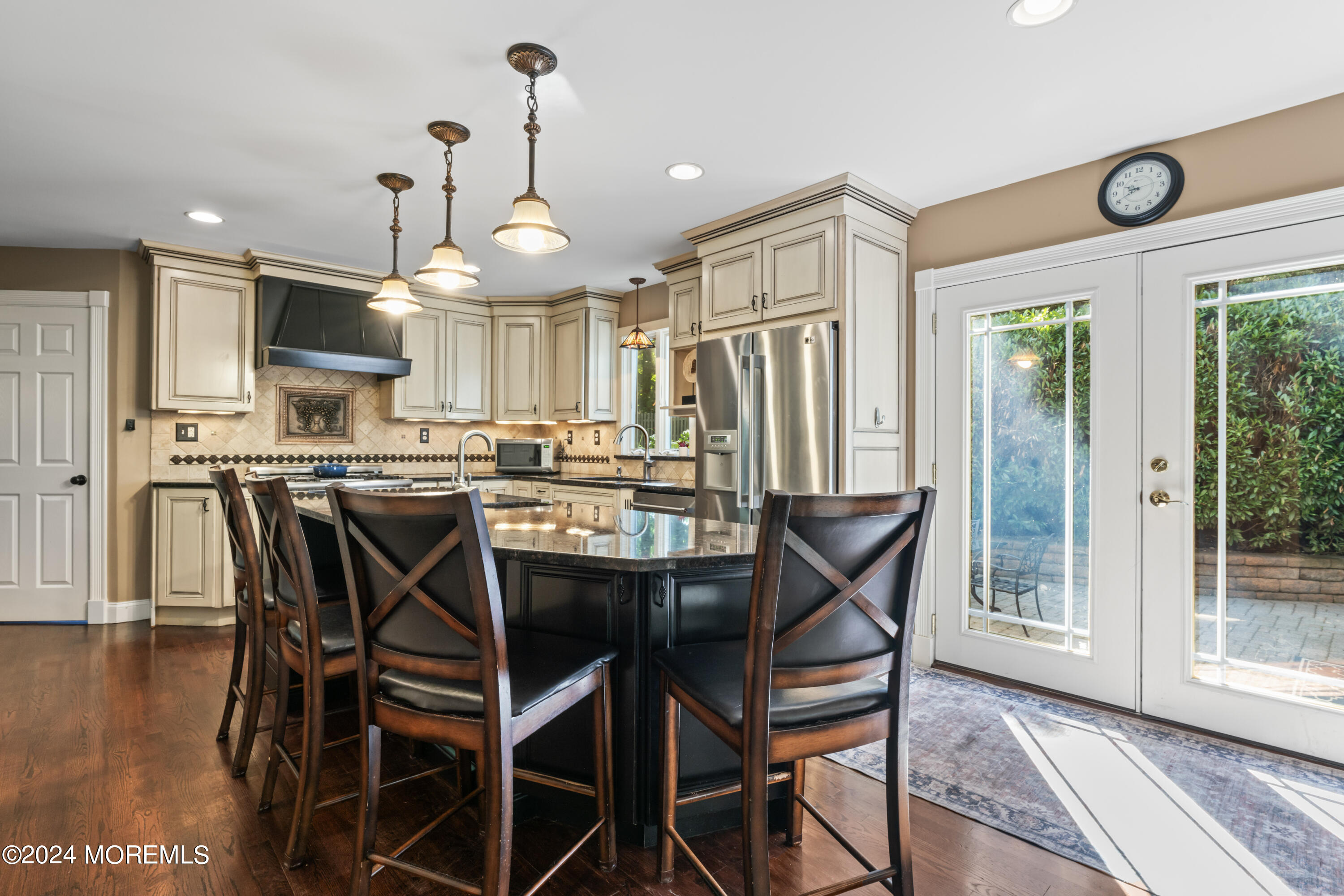 54 Rutherford Road Berkeley Heights, NJ 07922 - Photo 9 of 43 a view of a dining room with furniture window and wooden floor