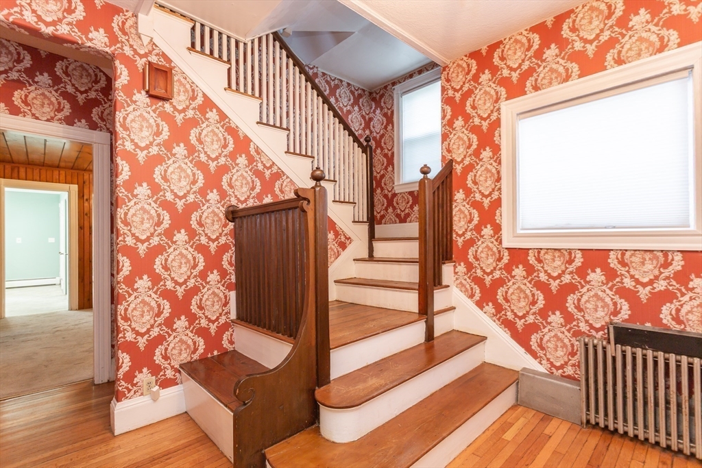 724 High Street Fall River, MA 02720 - Photo 7 of 39 a view of entryway with wooden floor