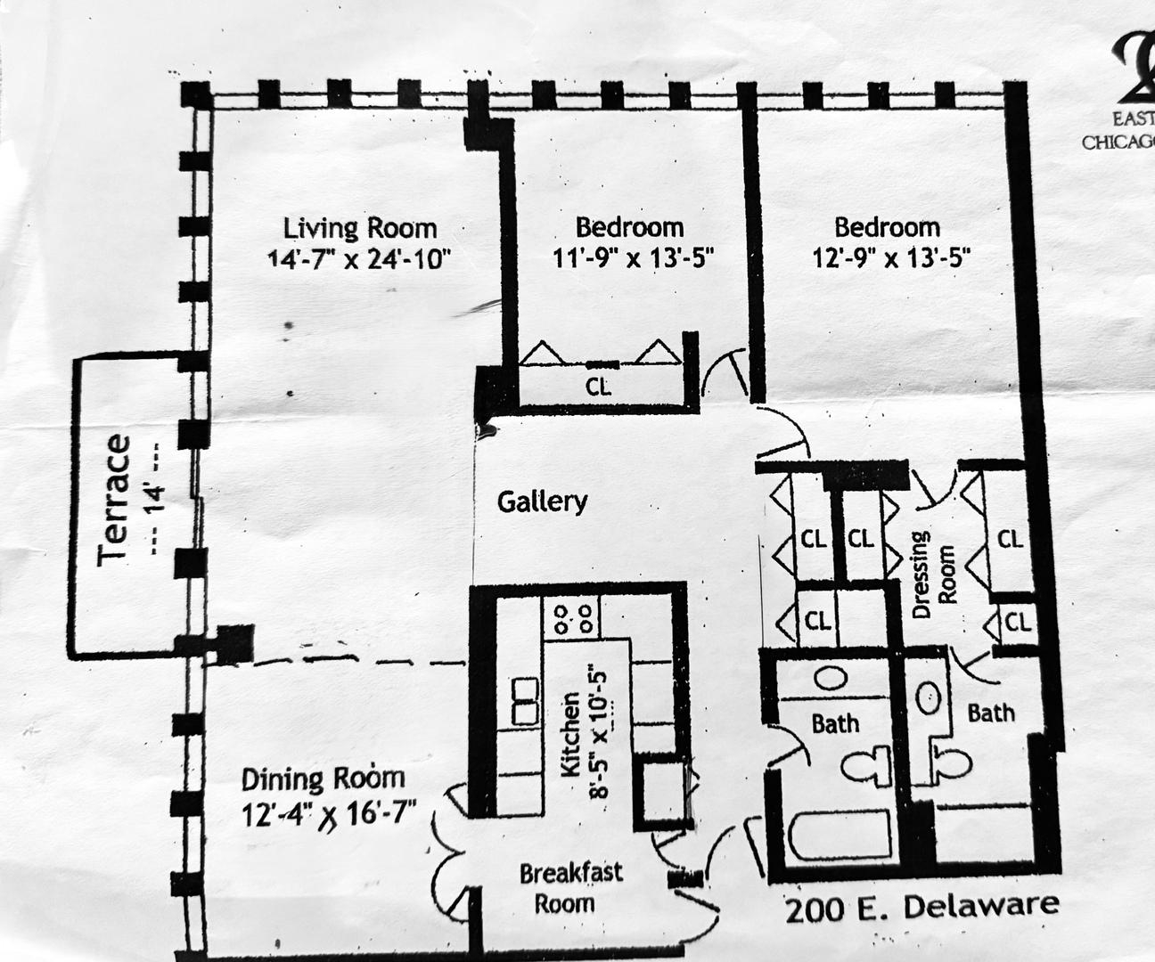 200 East Delaware Place, Unit 19A Chicago, IL 60611 - Photo 13 of 15 a picture of a book and a bed