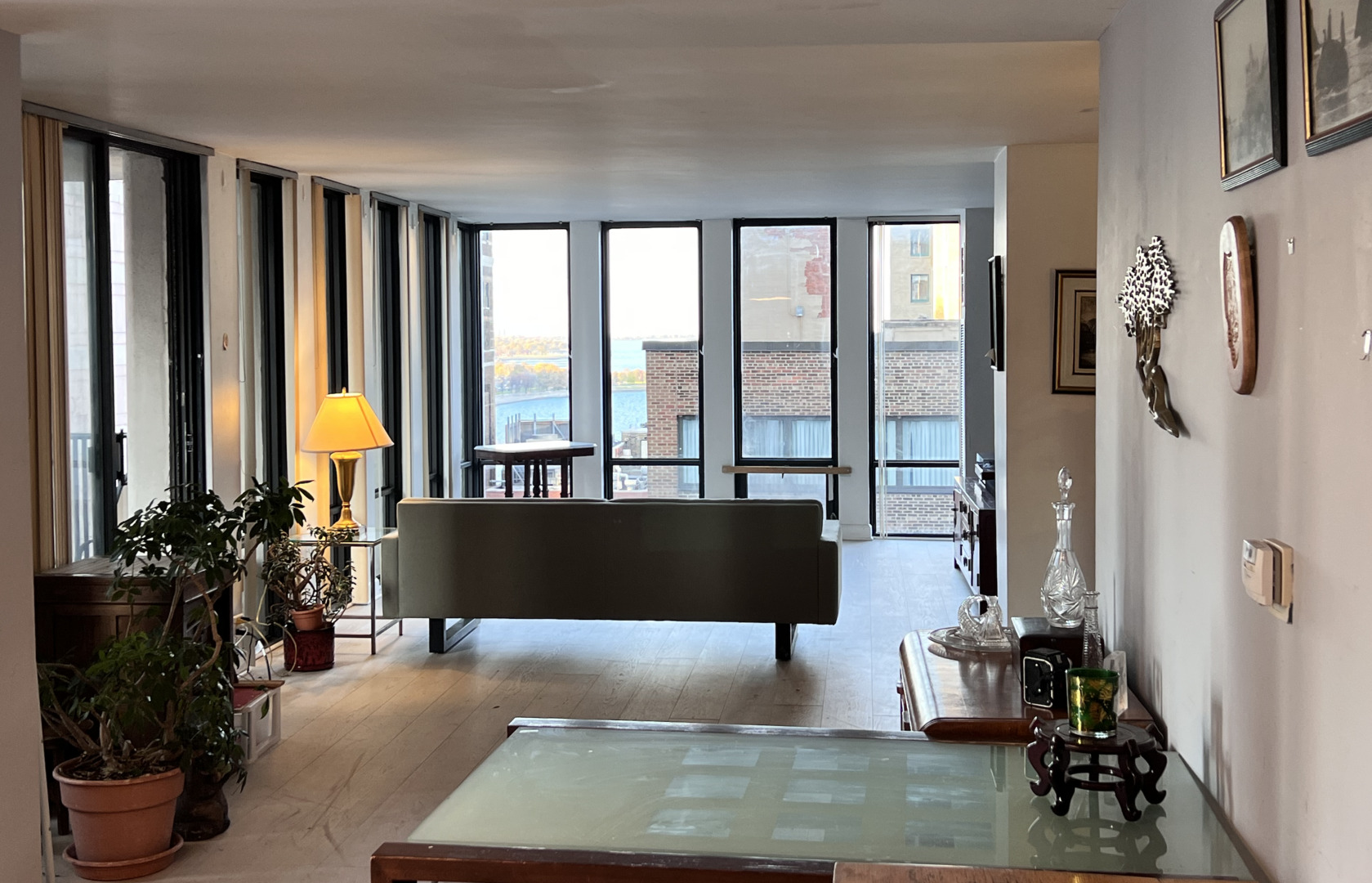 200 East Delaware Place, Unit 19A Chicago, IL 60611 - Photo 6 of 15 a living room filled with furniture and a large window