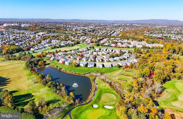 6013 Piney Grove Way Gainesville, VA 20155 - Photo 34 of 41 an aerial view of a house with a swimming pool yard and outdoor seating