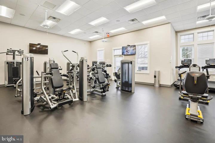 6013 Piney Grove Way Gainesville, VA 20155 - Photo 40 of 41 a view of a room with gym equipment