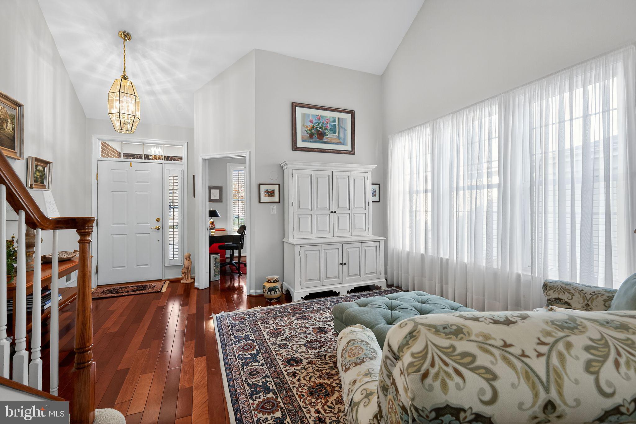 6013 Piney Grove Way Gainesville, VA 20155 - Photo 4 of 41 a bed sitting in a bedroom next to a window