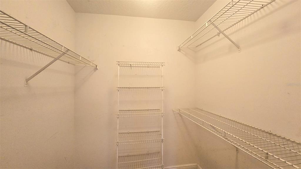 7667 North Wickham Road, Unit 522 Melbourne, FL 32940 - Photo 15 of 25 a view of walk in closet