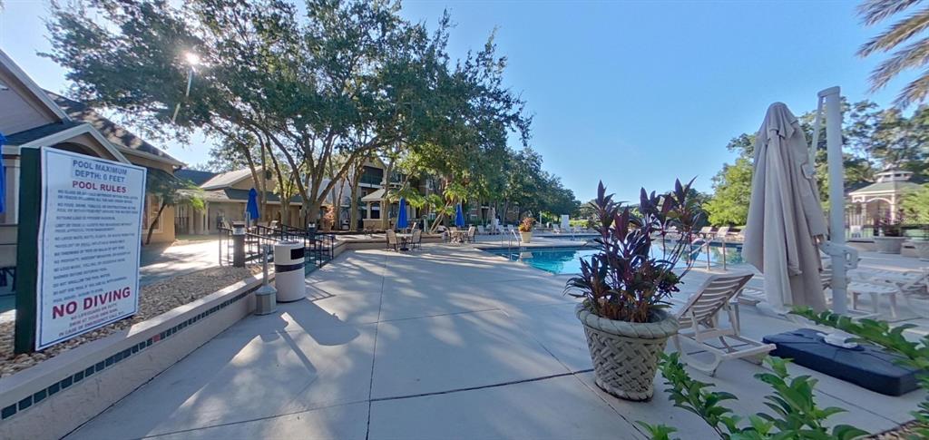 7667 North Wickham Road, Unit 522 Melbourne, FL 32940 - Photo 20 of 25 a outdoor view with a seating space