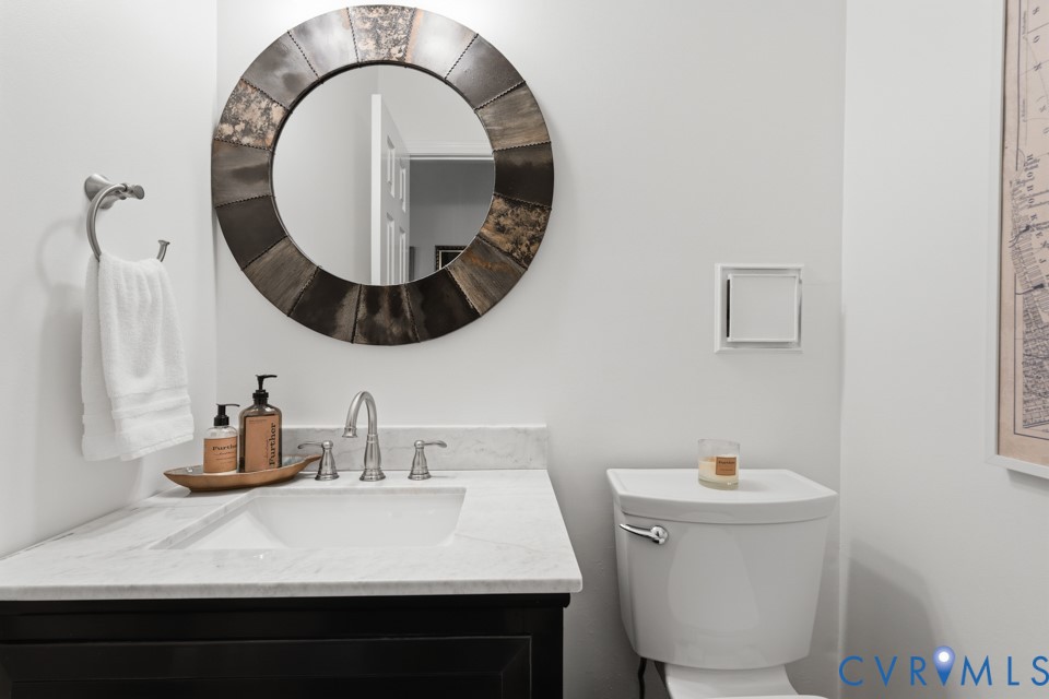 3009 Sable Road Henrico, VA 23233 - Photo 22 of 51 a bathroom with a sink and a mirror