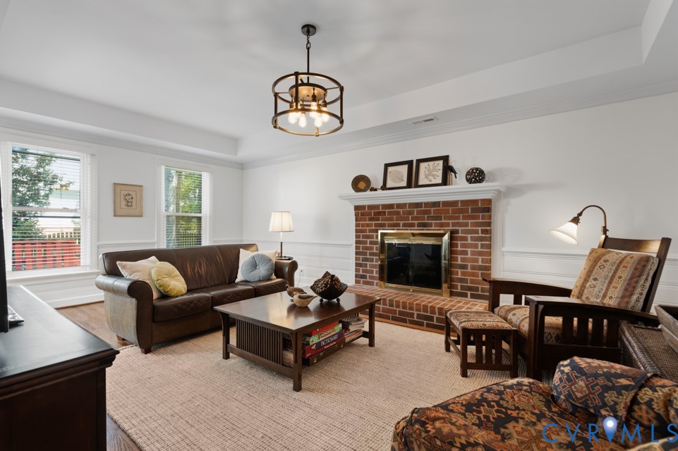 3009 Sable Road Henrico, VA 23233 - Photo 25 of 51 a living room with furniture a fireplace and window