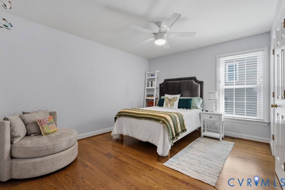 3009 Sable Road Henrico, VA 23233 - Photo 38 of 51 a bedroom with a bed and wooden floor