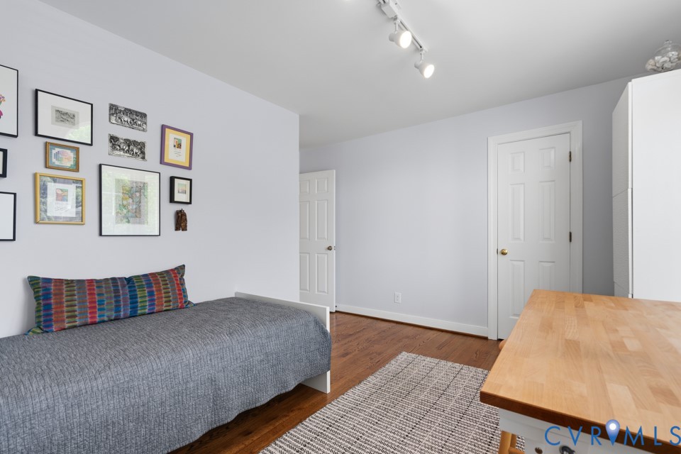 3009 Sable Road Henrico, VA 23233 - Photo 41 of 51 a bedroom with a bed and wooden floor