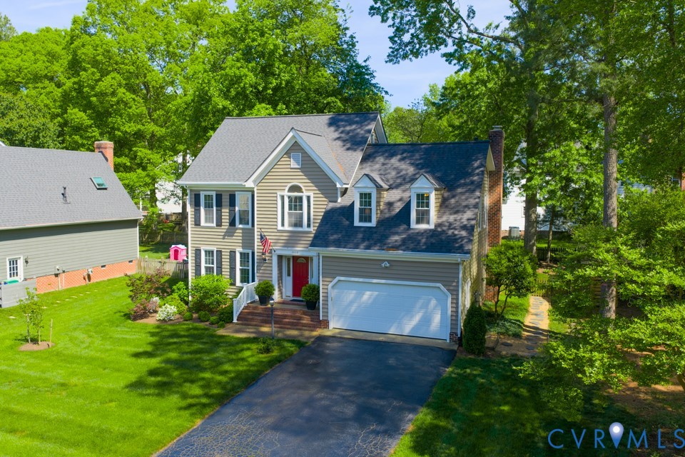 3009 Sable Road Henrico, VA 23233 - Photo 50 of 51 a front view of a house with a yard and trees