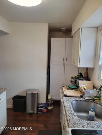 a kitchen with a appliances and cabinets