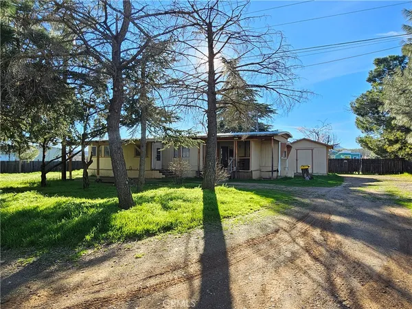 a view of a door and wooden floor