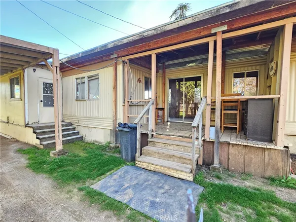 a bathroom with a toilet and a bathtub