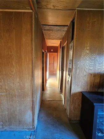 a view of gallery with door