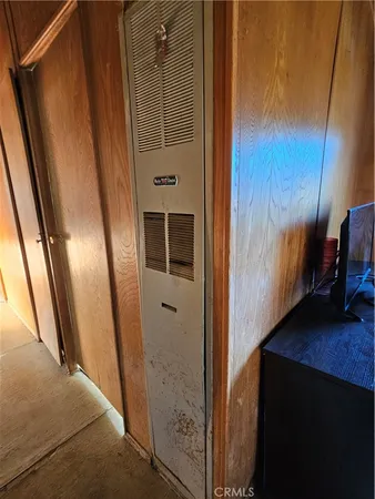 a view of a backyard with wooden fence