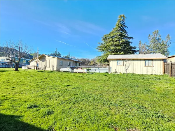 a view of a room with wooden walls