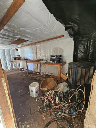 a view of a chair and table in the kitchen