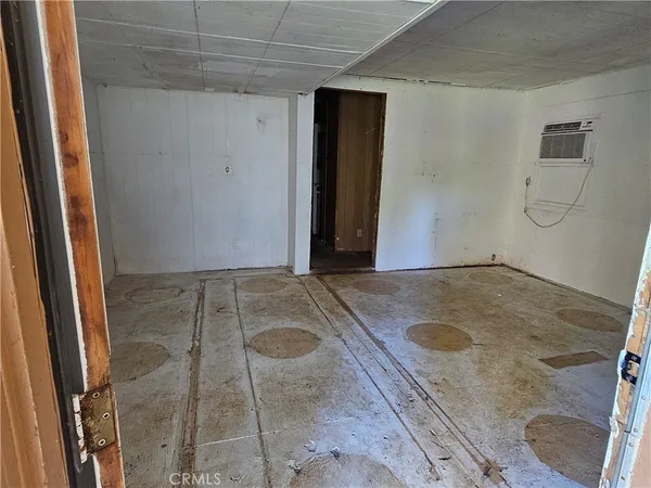 a view of yard with swimming pool and green space