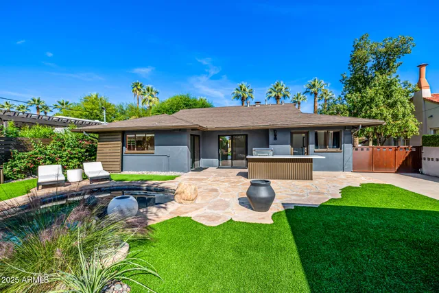 a view of swimming pool from a balcony