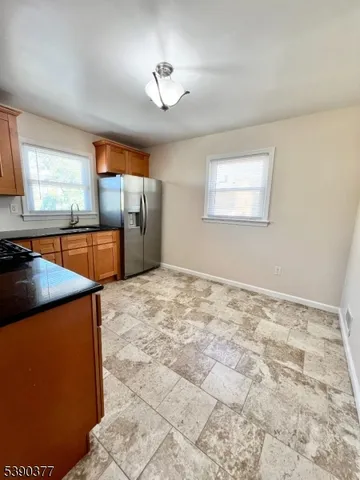 a view of a kitchen with a sink