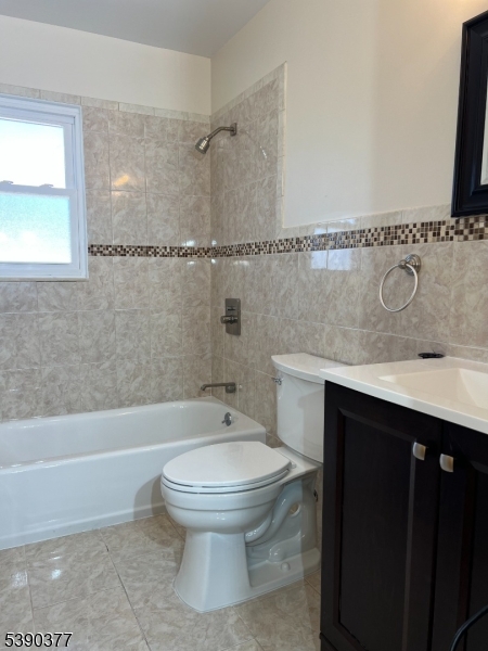 1575 Lenox Place, Unit 2 Rahway, NJ 07065 - Photo 7 of 12 a bathroom with a sink toilet and shower
