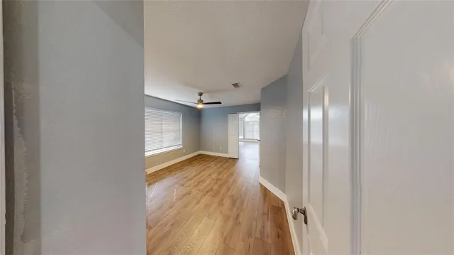 a view of entryway with wooden floor