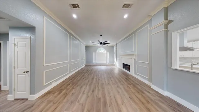 a view of table and chair with wooden floor