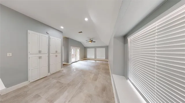 a view of a livingroom with wooden floor