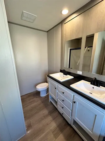 a bathroom with a sink and mirror