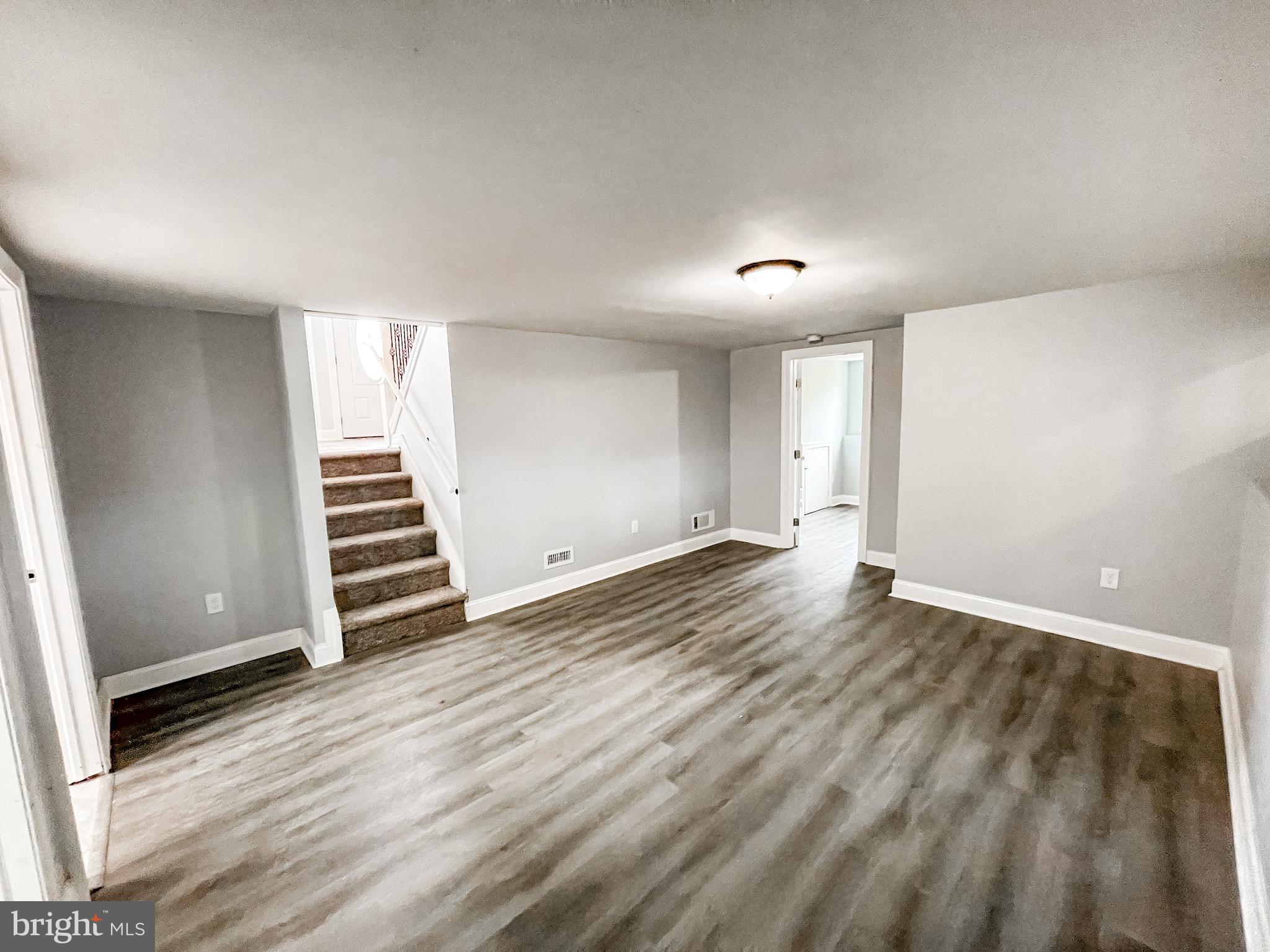 34 Marlyn Road Newark, DE 19713 - Photo 12 of 32 a view of wooden floor and windows in a room