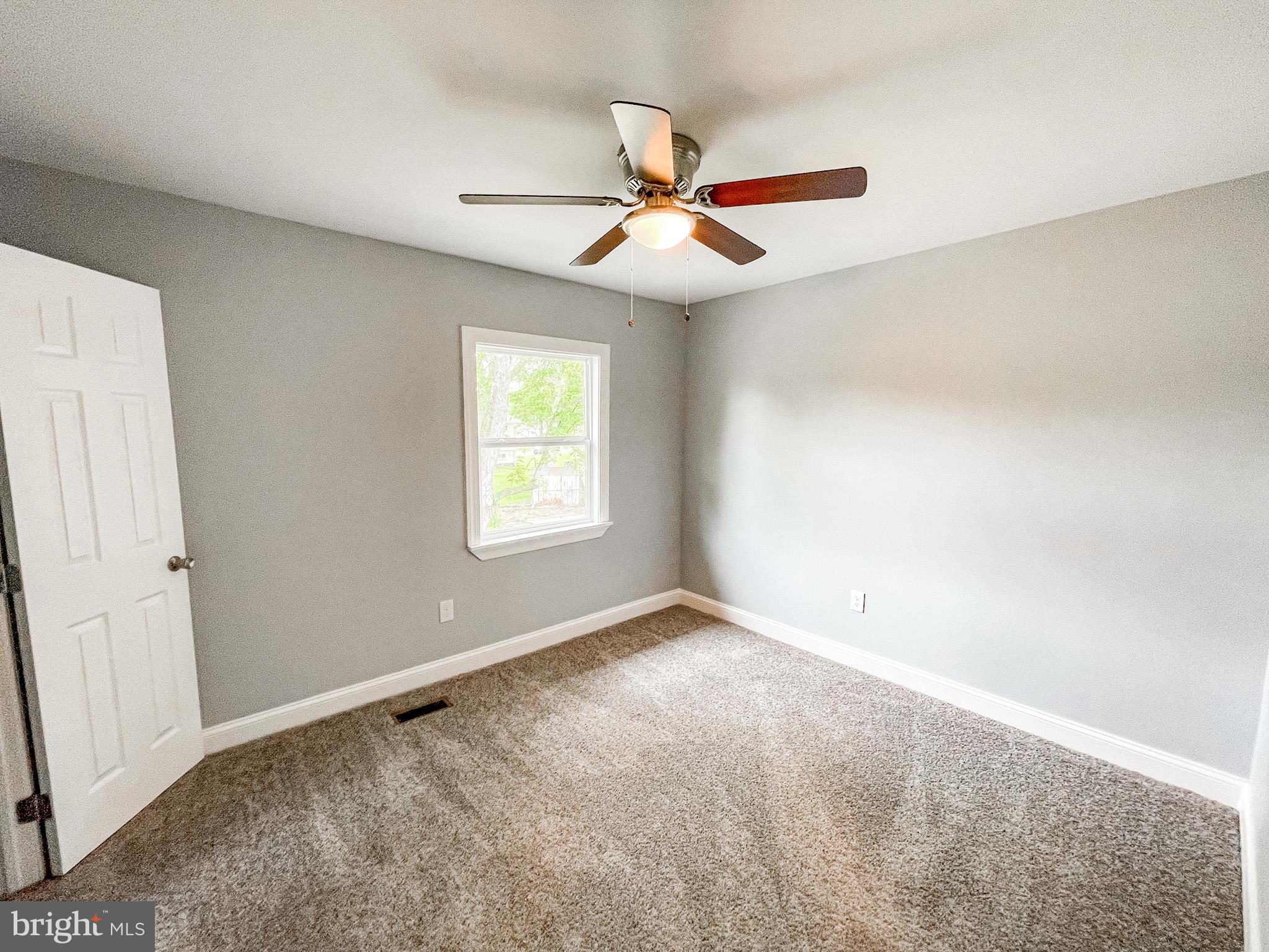 34 Marlyn Road Newark, DE 19713 - Photo 22 of 32 an empty room with windows and fan