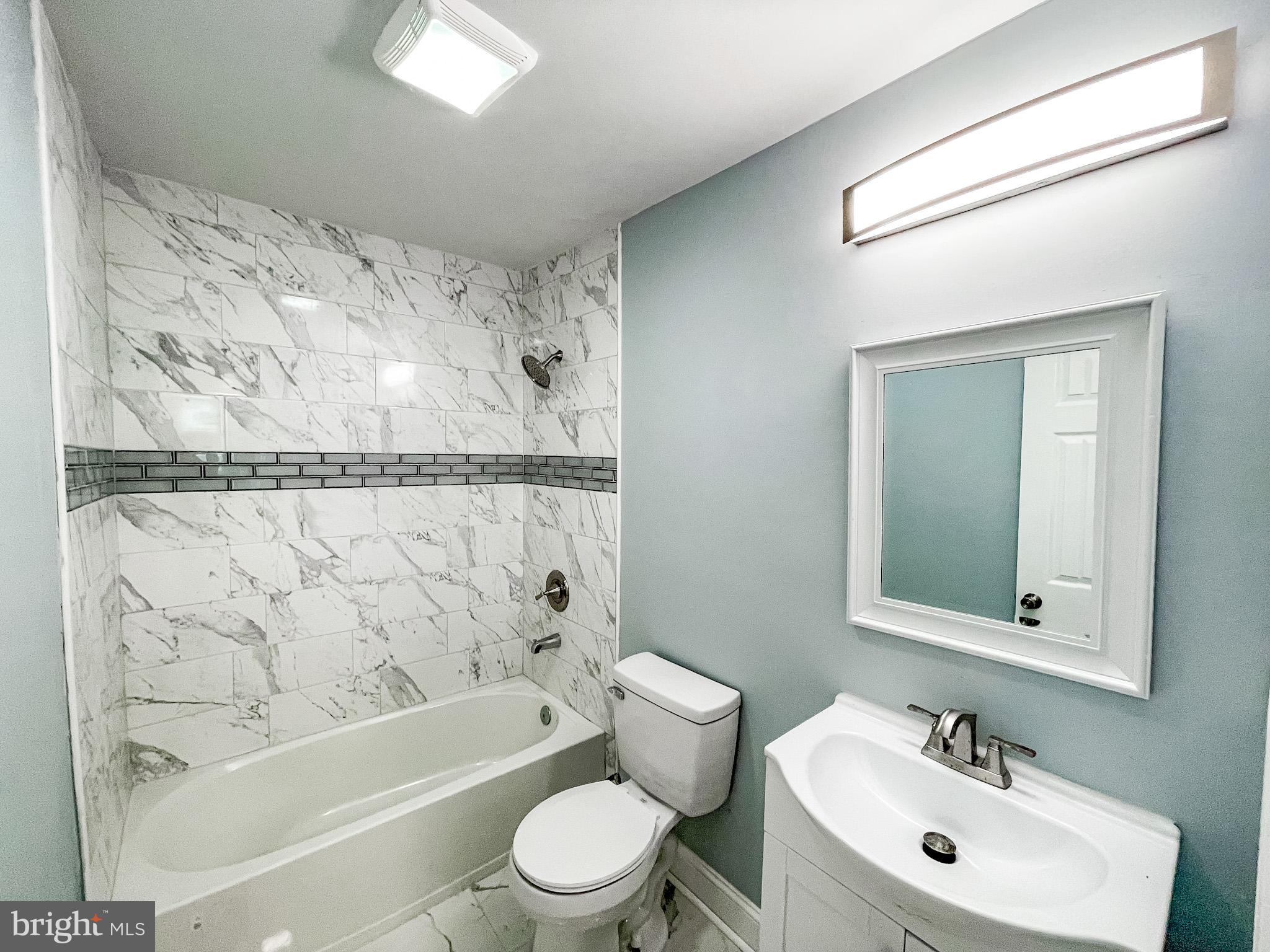34 Marlyn Road Newark, DE 19713 - Photo 27 of 32 a bathroom with a toilet sink and bathtub