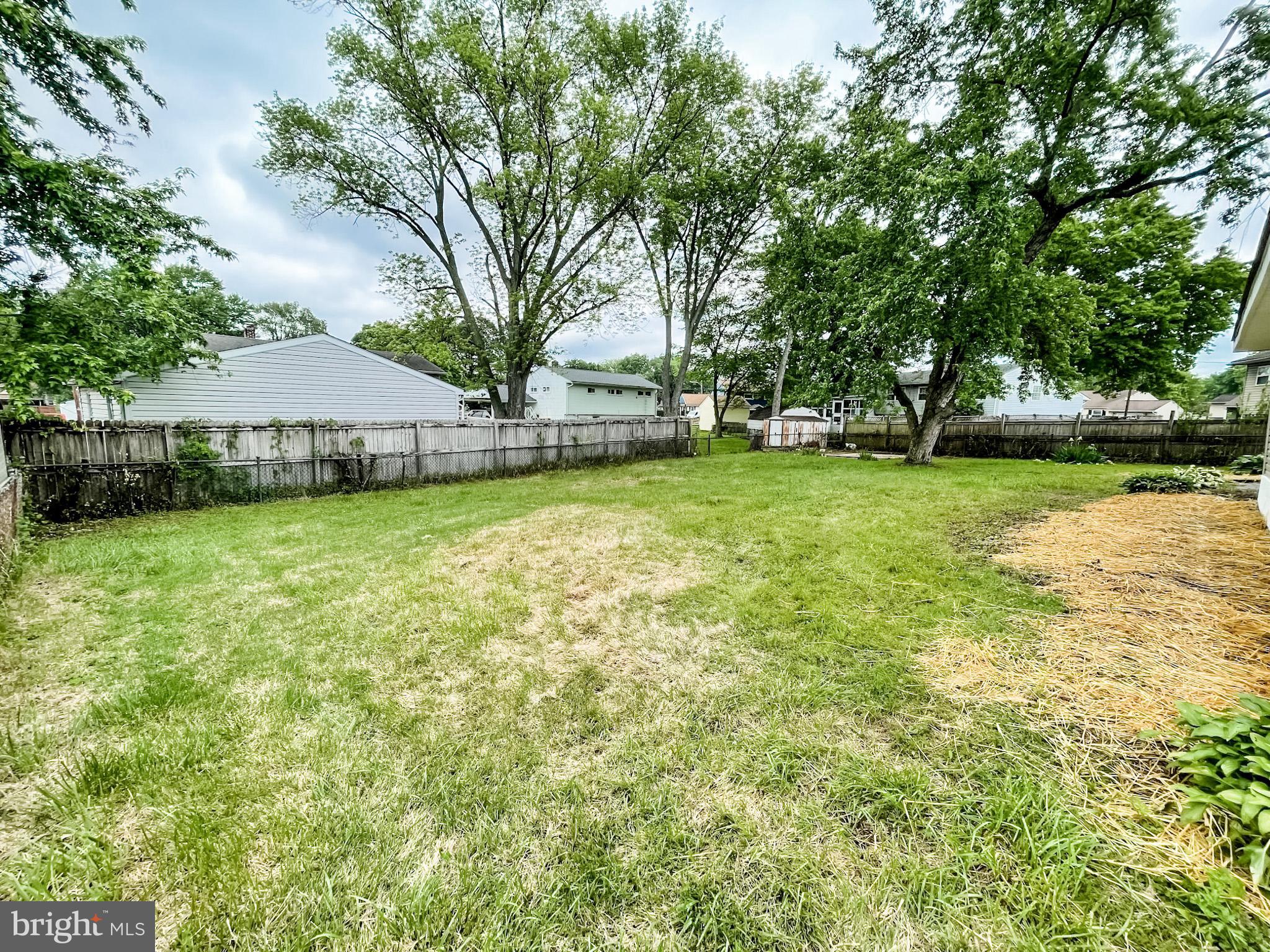 34 Marlyn Road Newark, DE 19713 - Photo 31 of 32 a view of a house with a big yard and large trees