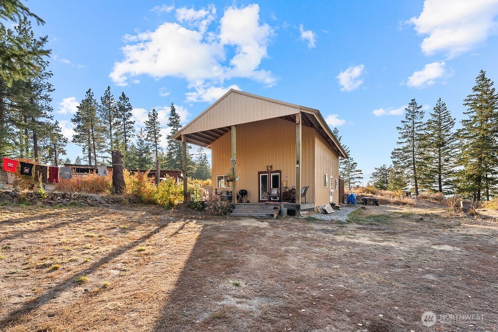 3050 East Stiss Canyon Road Wenatchee, WA 98801 - Photo 1 of 27 a view of a house with a patio