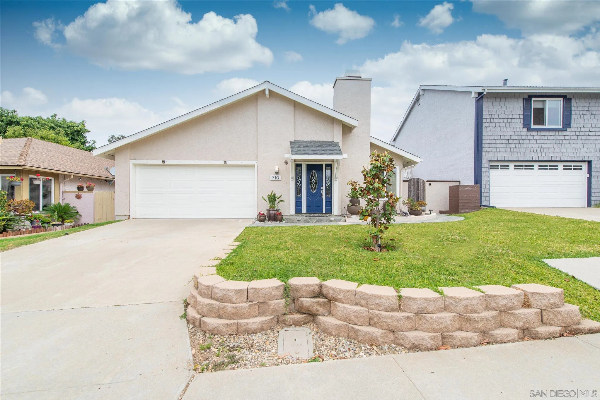 710 Anchor Way Carlsbad, CA 92008 - Photo 1 of 33 a front view of house with a garden