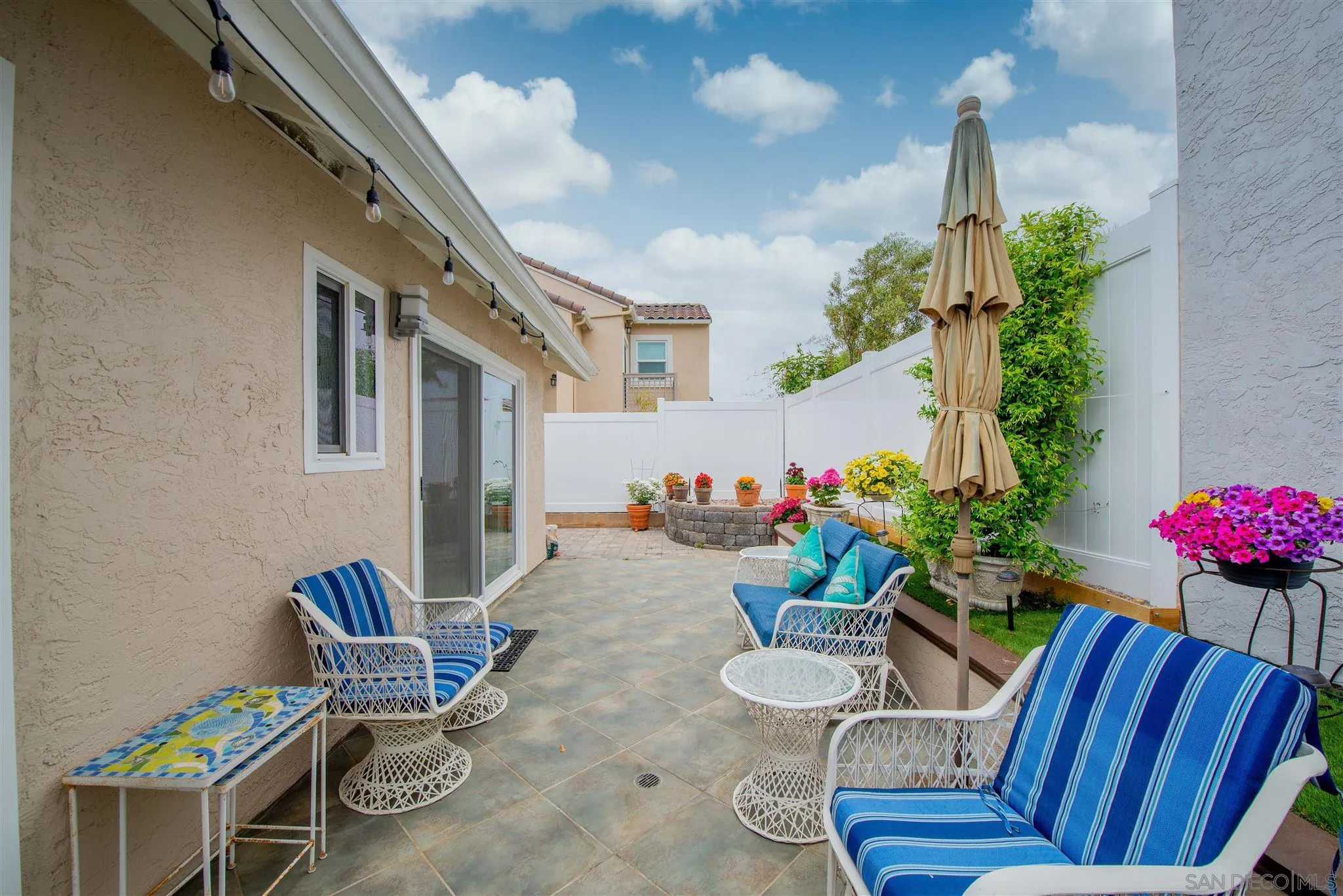 710 Anchor Way Carlsbad, CA 92008 - Photo 24 of 33 a front view of a house with outdoor seating