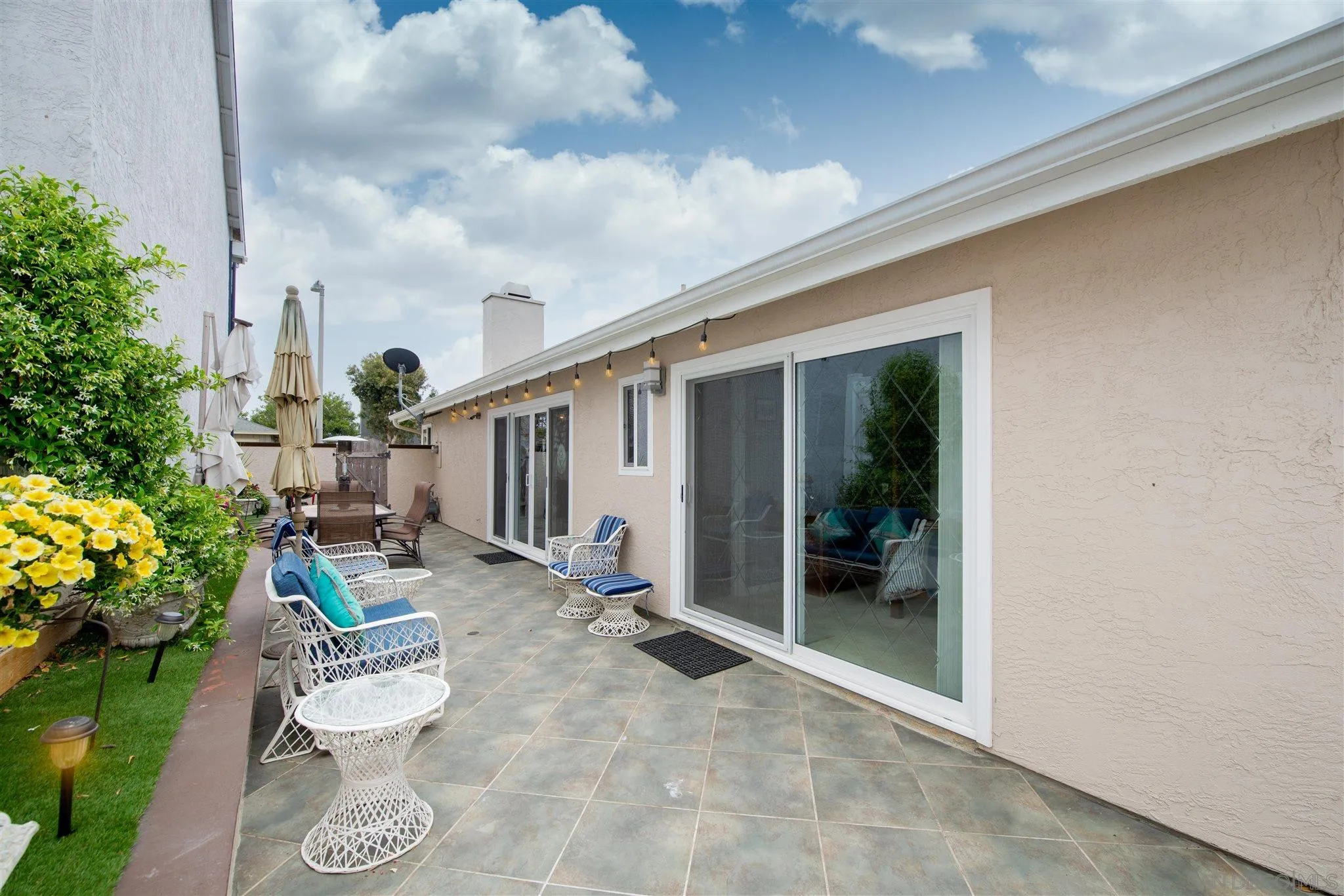 710 Anchor Way Carlsbad, CA 92008 - Photo 26 of 33 a view of a porch with furniture and garden