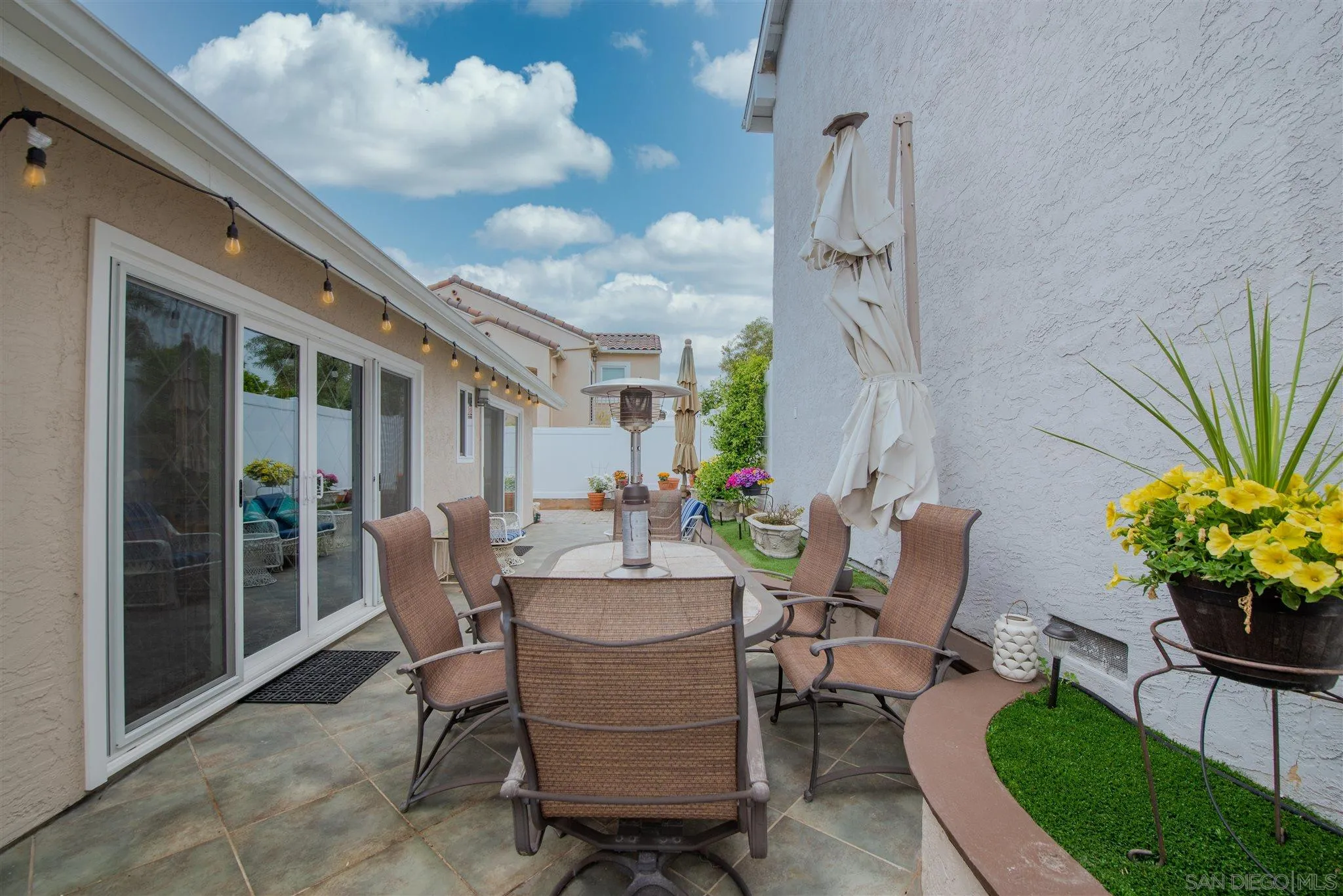710 Anchor Way Carlsbad, CA 92008 - Photo 27 of 33 a view of a patio in backyard