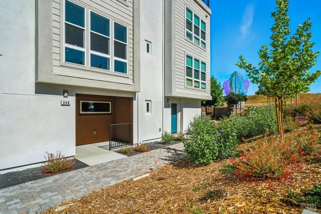 a front view of a building with street view