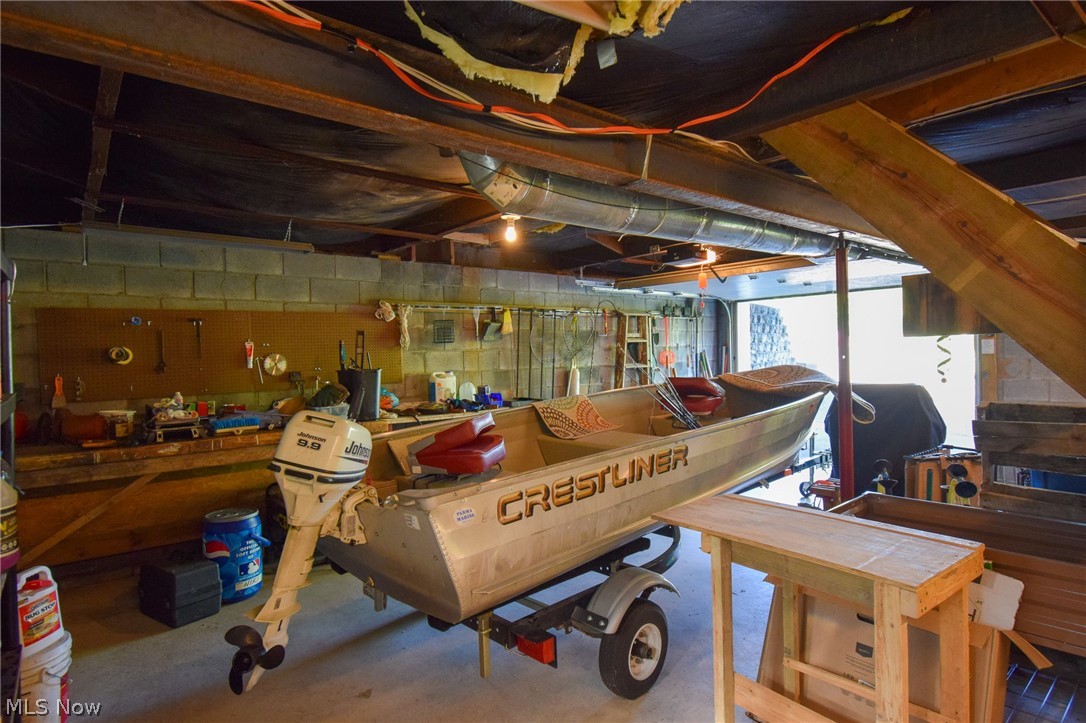 26933 Marina Road Freeport, OH 43973 - Photo 16 of 18 Garage featuring a workshop area