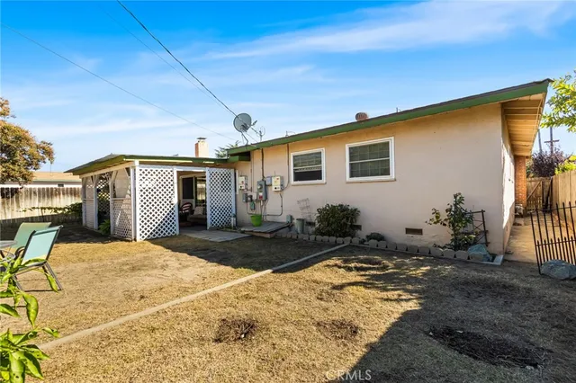 a bedroom with furniture and garden view