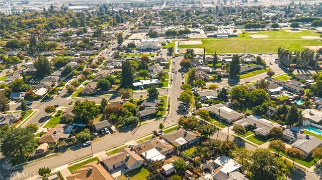 an aerial view of residential building with parking space