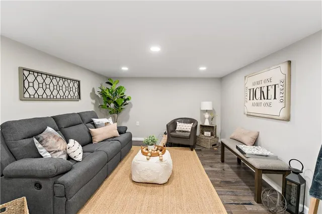 a living room with furniture and a table