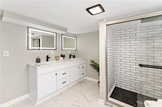 a bathroom with a sink and a mirror