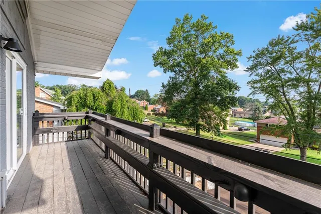 a view of balcony with furniture