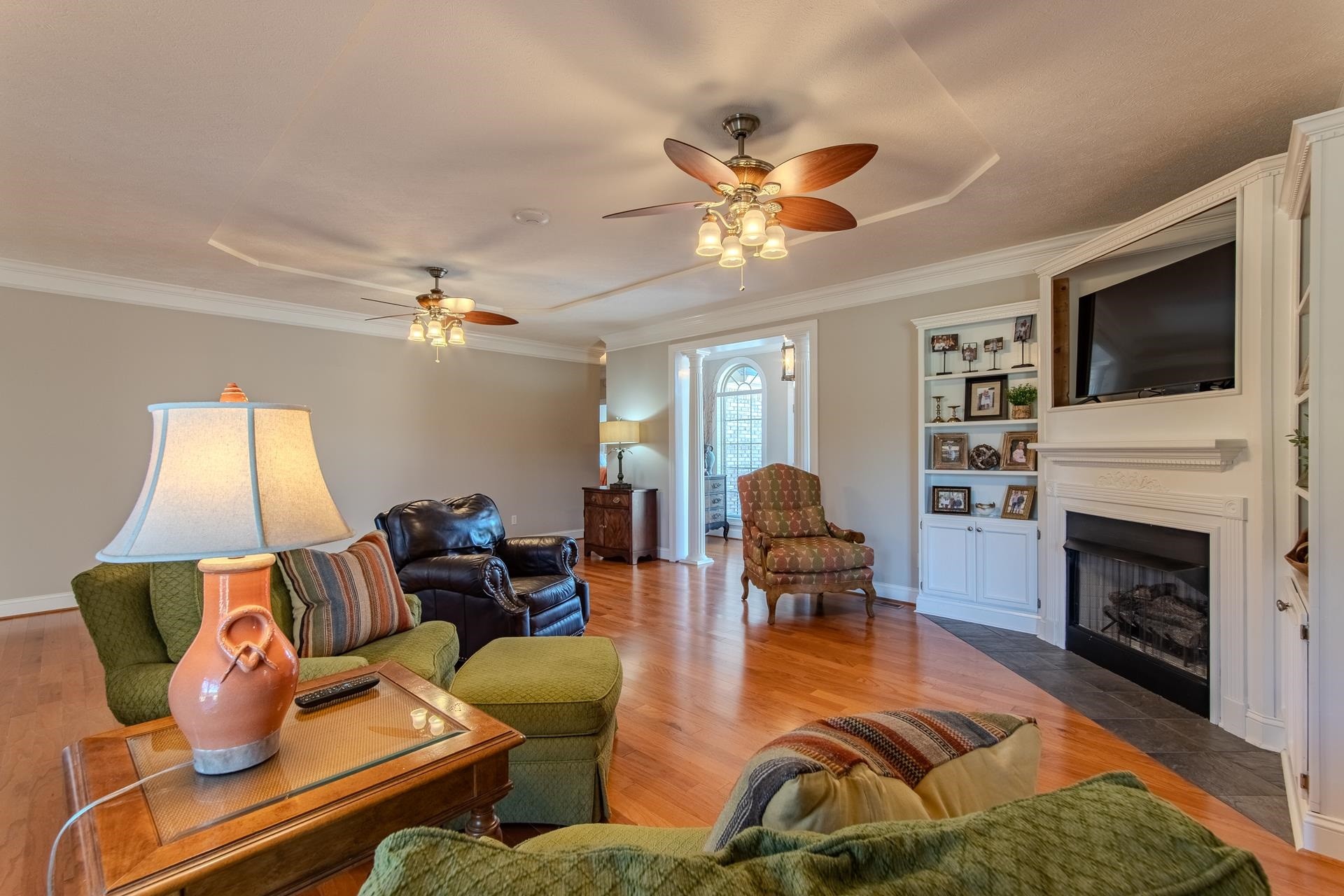 6170 Highway 226 Savannah, TN 38372 - Photo 11 of 40 a living room with furniture fireplace and flat screen tv